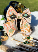Pot of Rainbow Gold Sailor Bow